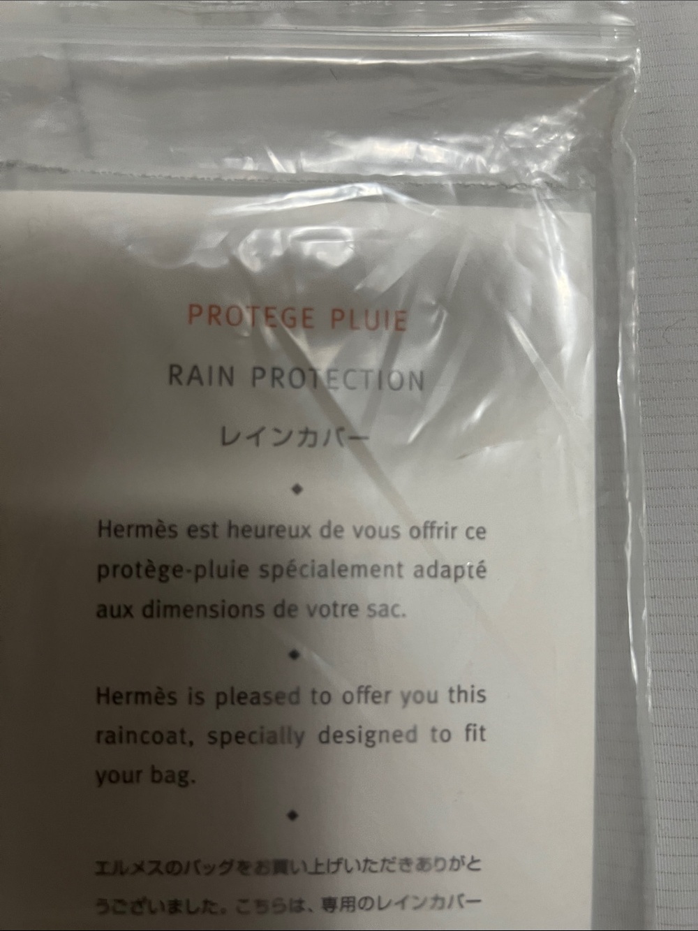 Hermes Rain Protection Cover in Clear/White